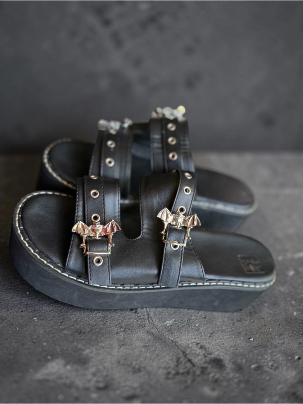 Black Leather Studded Slide Sandals with Bat Buckles